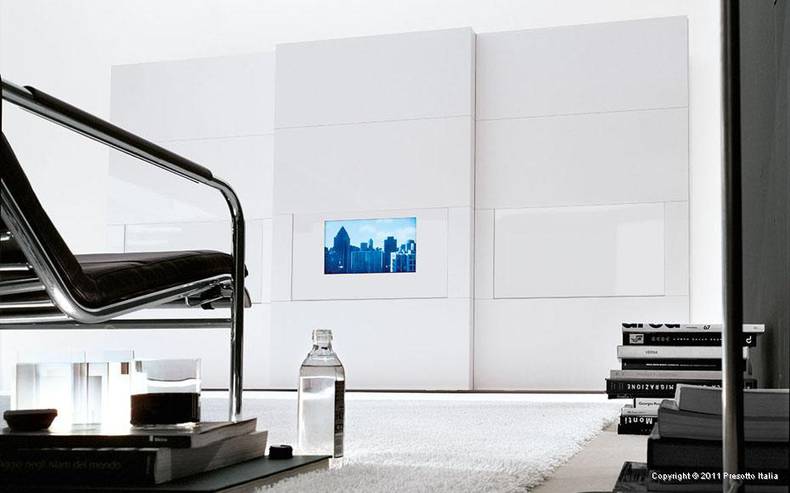 Two in one: a bedroom wardrobe plus TV-set by Presotto Italia