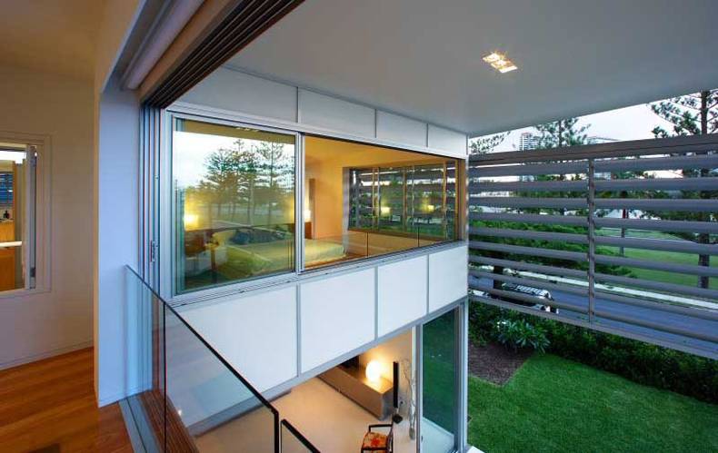 Modest single family beach house by BDA Architects