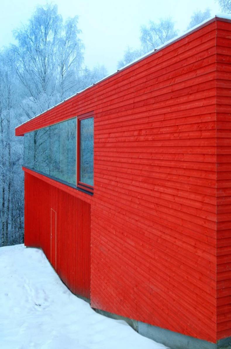 Wooden House with Red Facade by JVA Architects