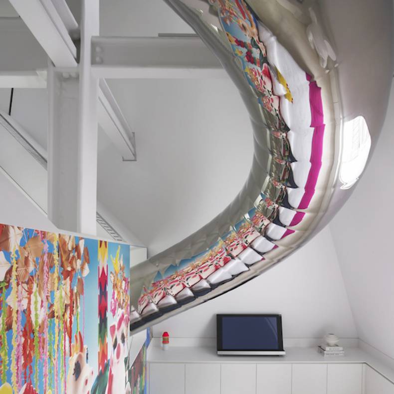 Renovated Penthouse with a Slide by David Hotson